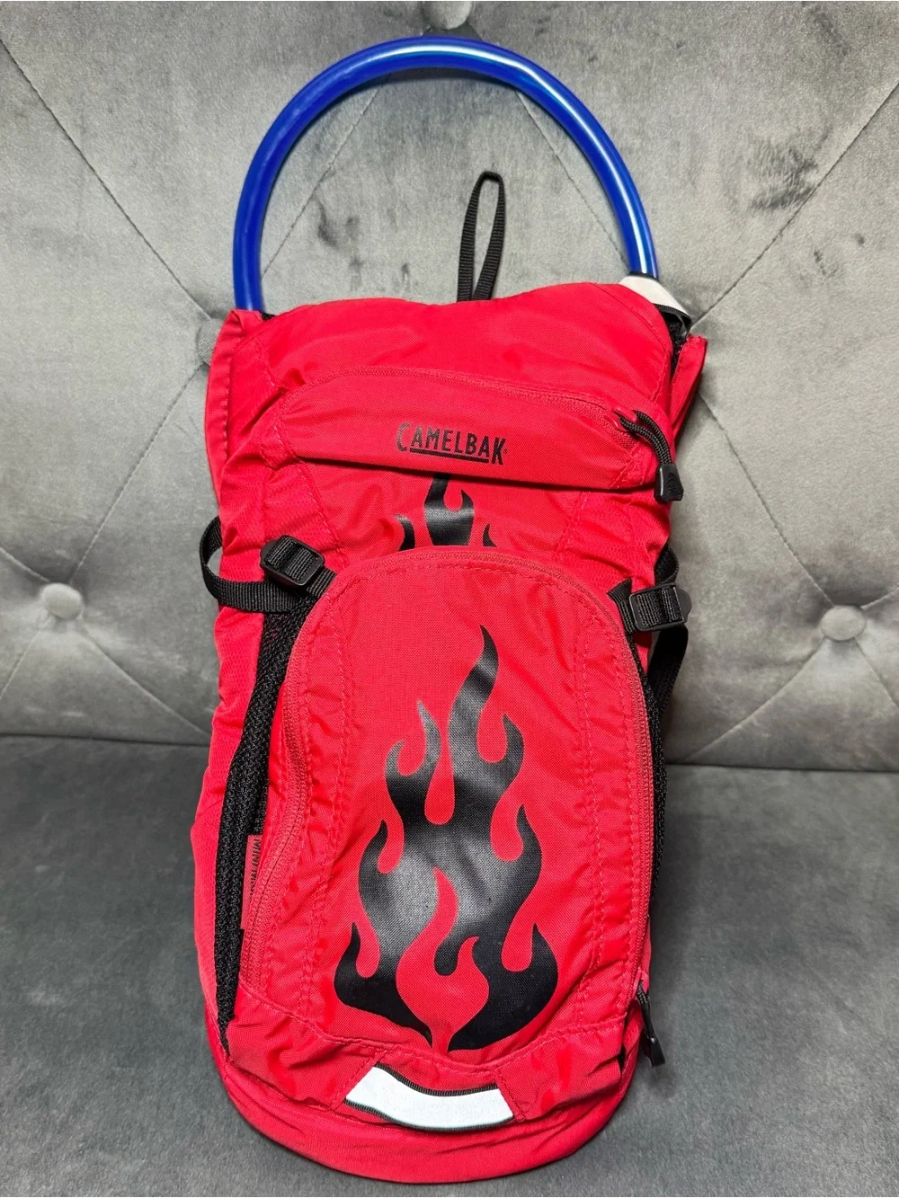 CamelBak Mini M.U.L.E. Kids’ Hydration Red Backpack with Black Flame Graphic